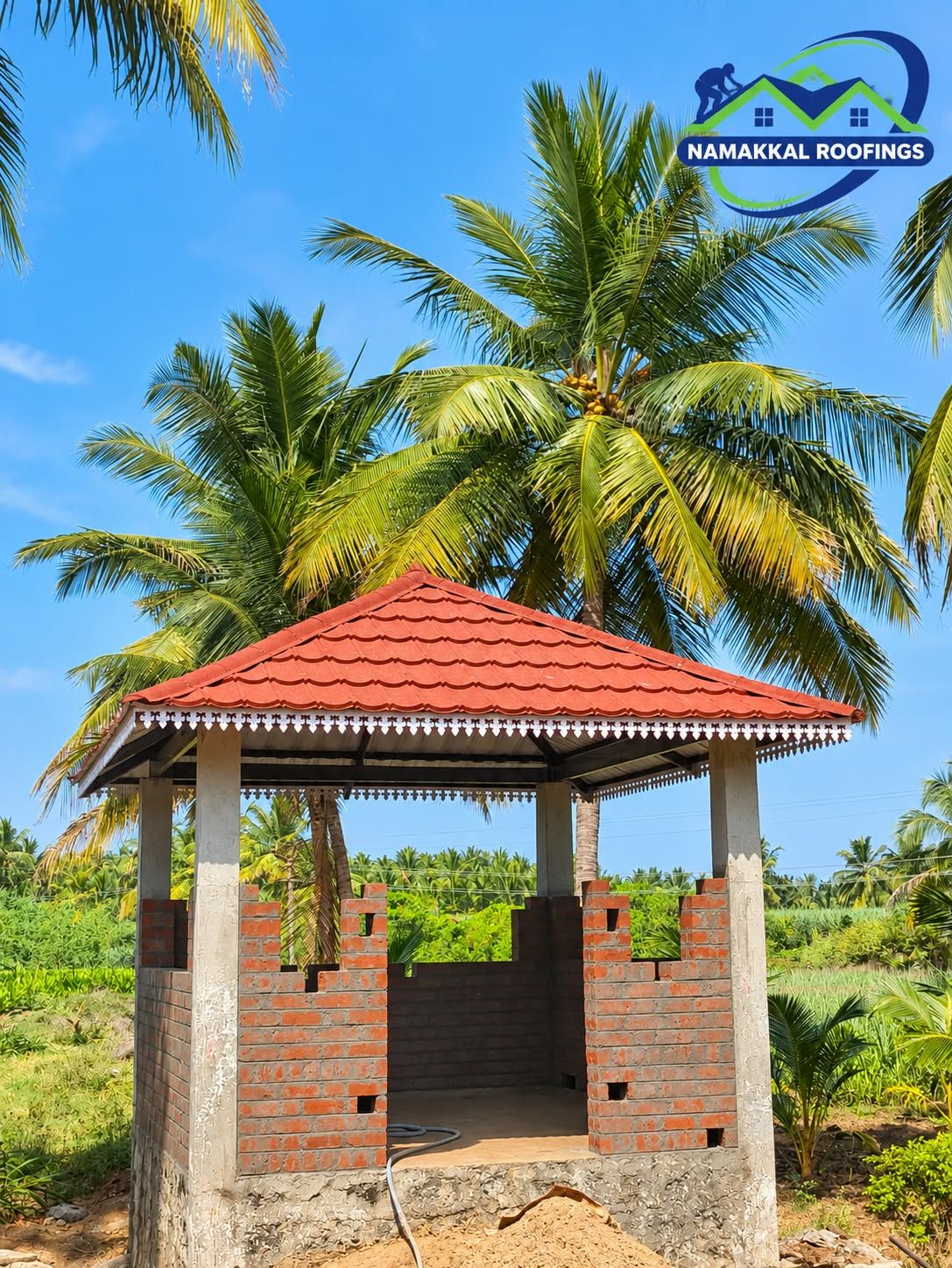 Small clay tile roof over a well