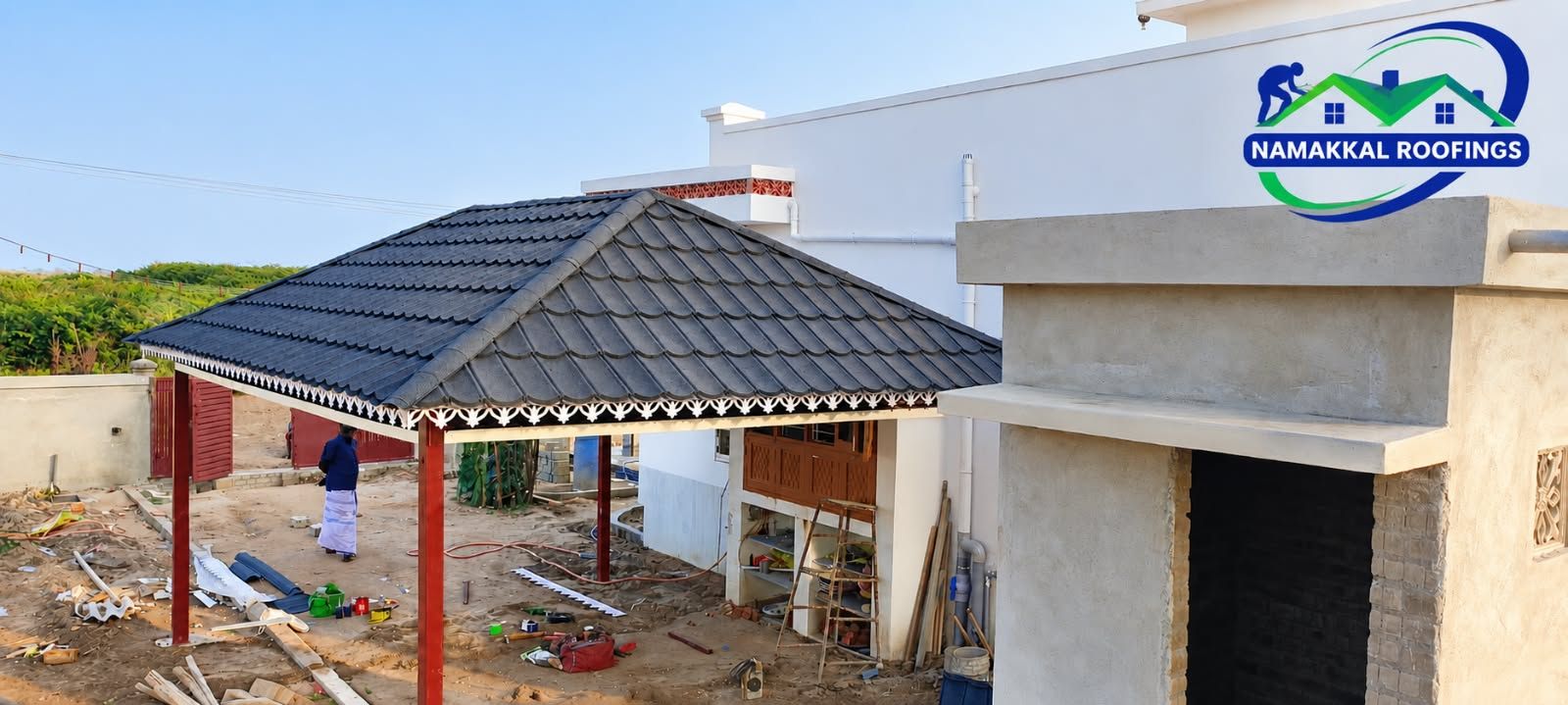 Grey stone-coated sheets over a carport