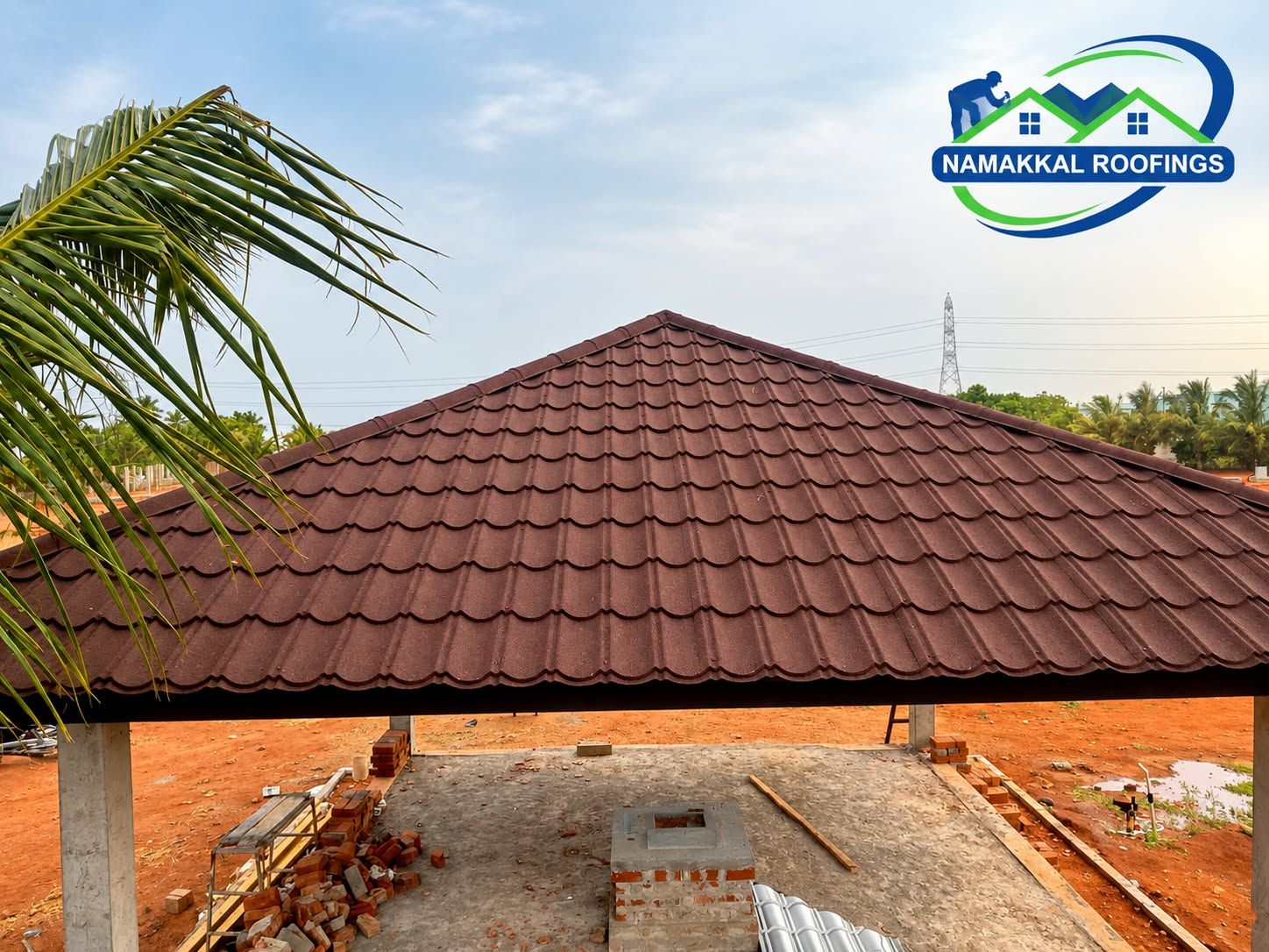 Open pavilion with a brown clay tile roof