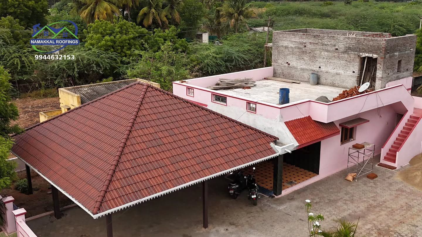 Drone view of a home with a new clay tile roof